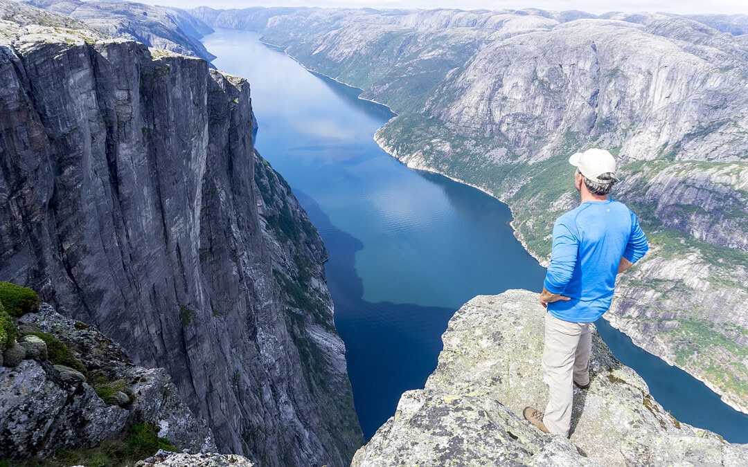 Breathtaking view from Kjerag Mountain overlooking Lysefjord in Norway, perfect for outdoor adventure seekers.