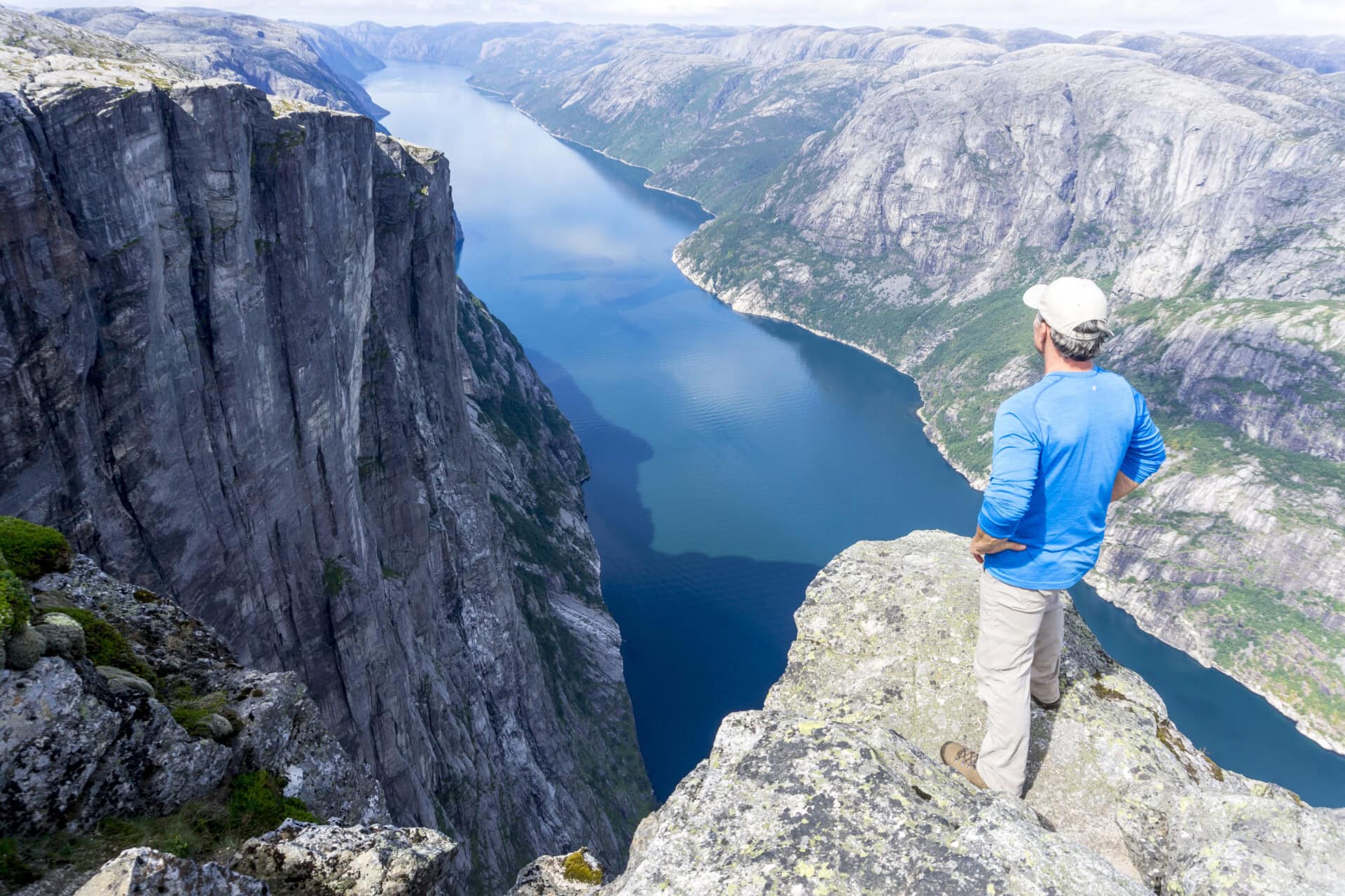 Breathtaking view from Kjerag Mountain overlooking Lysefjord in Norway, perfect for outdoor adventure seekers.